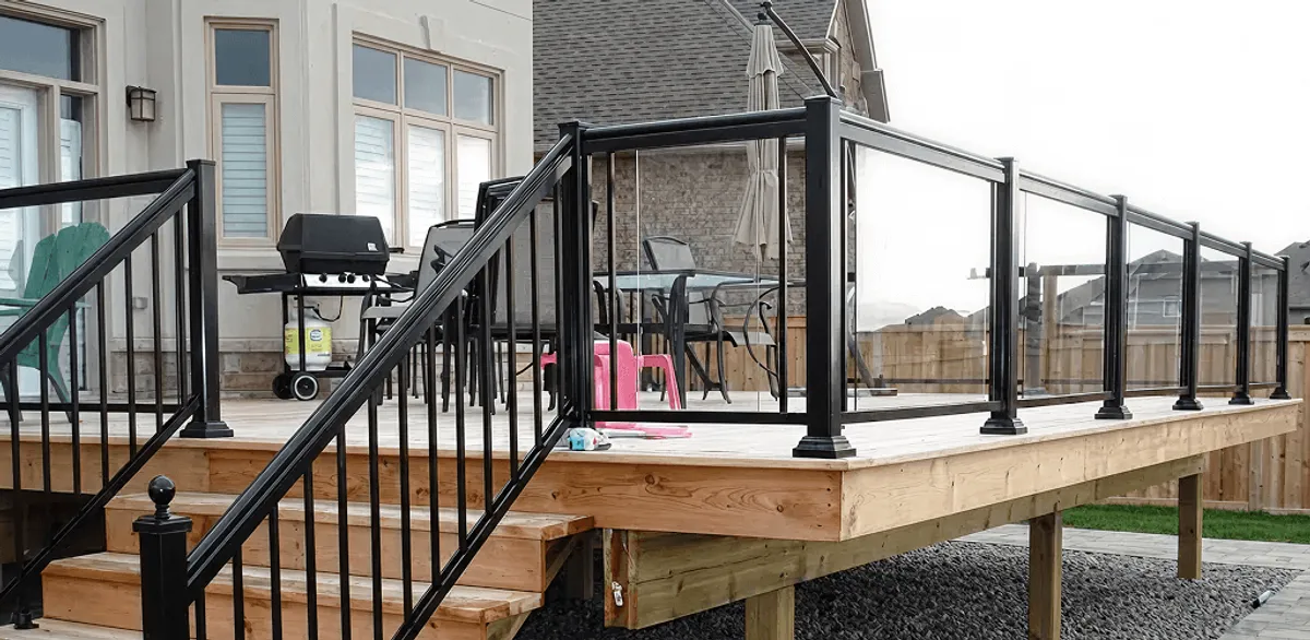 Handrail installation on a deck staircase for safety and code compliance in El Paso, TX