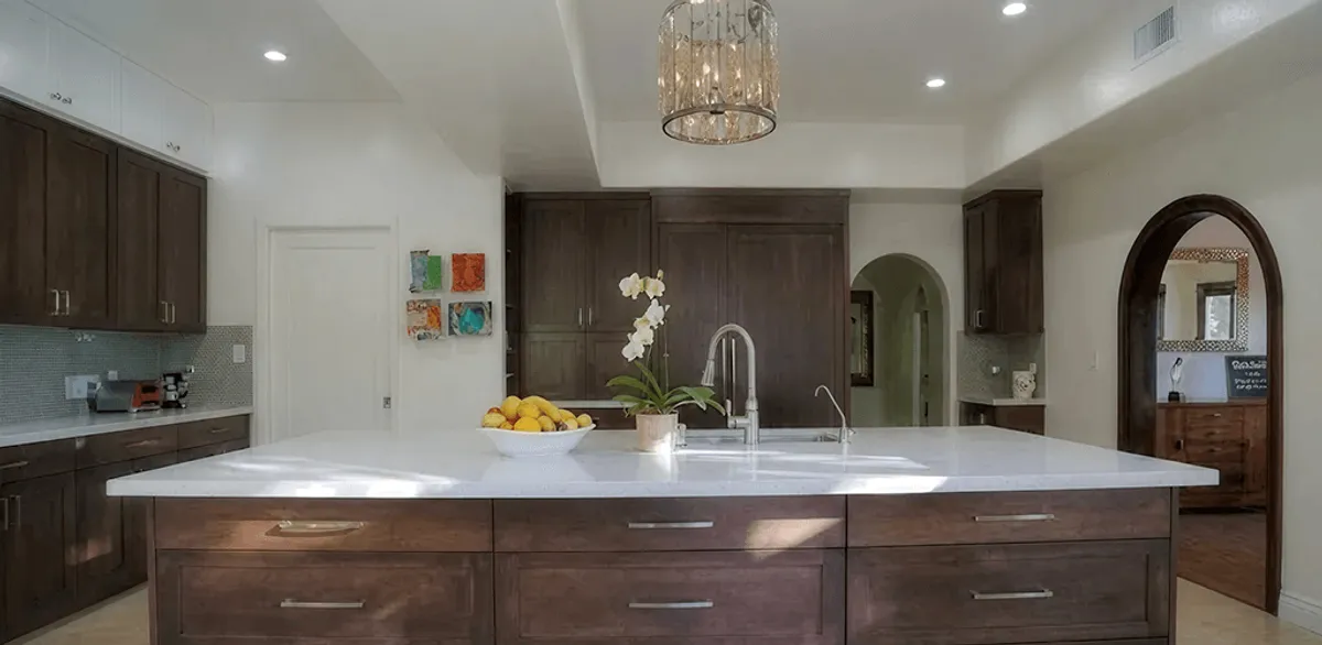 Cabinet refacing project with updated kitchen cabinets and island in El Paso, TX